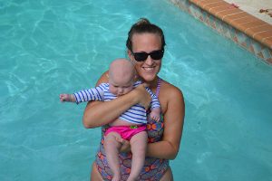 lesson length, mom holding her infant in the pool